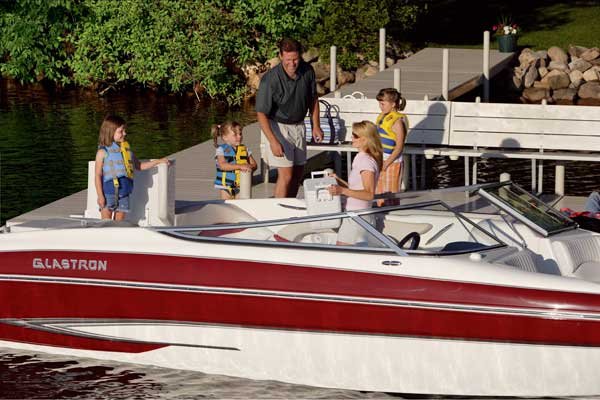 Family Boarding Their Boat