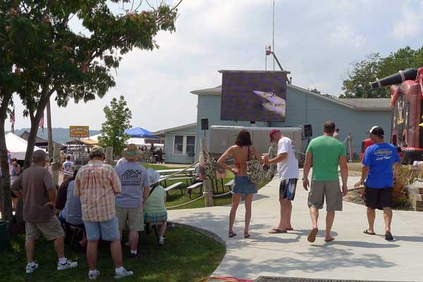 Large screen TV outside Captain Ron's Bar and Grill.