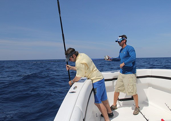 Two Men Fishing for King Mackerel