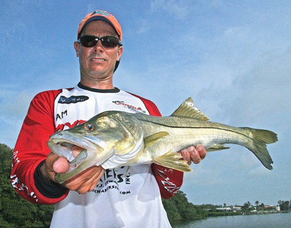 Captain Jason Stock with a Snook Catch