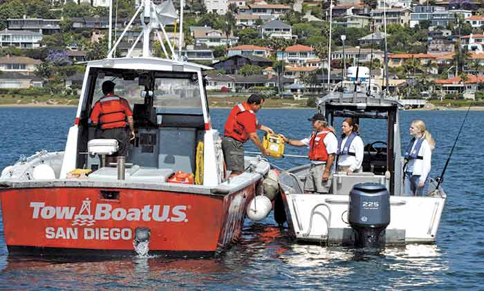TowBoatUS delivering battery