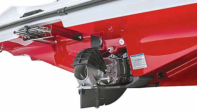 A product shot of a jet drive attached to a red boat