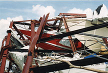 High-rise boat storage racks toppled by a storm's high winds