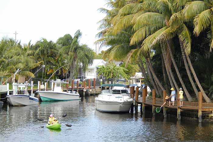 Fishing and kayaking with boats docked on the Intracoastal Waterway in Fort Lauderdale