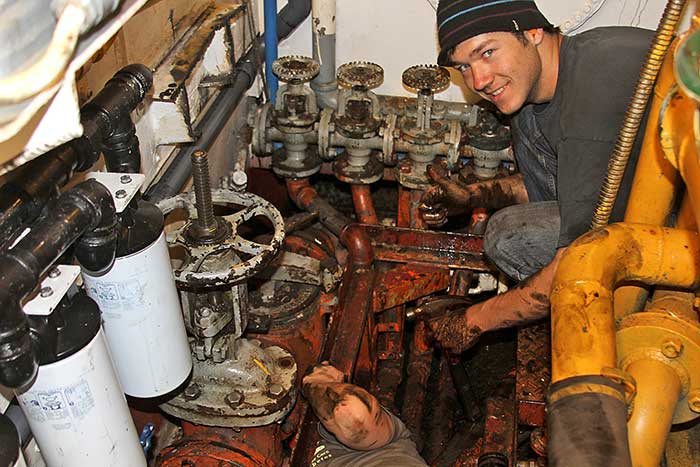 Working on a boat engine