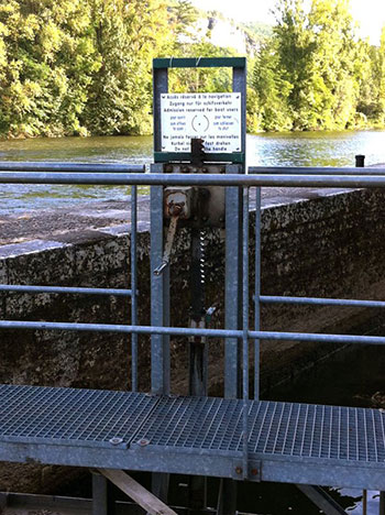 Lock Crank on a Metal Walkway