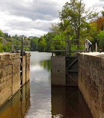 Man Opening Canal Lock