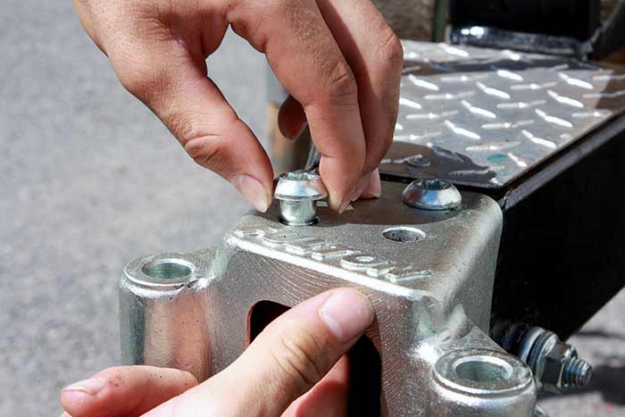 Install hinge bolts