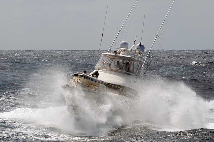 Wave hitting fishing boat