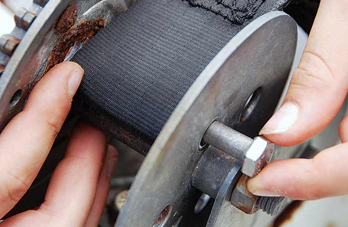 Attach new winch strap