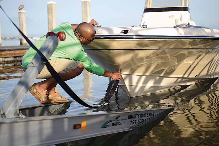 Connecting the winch strap to the boat
