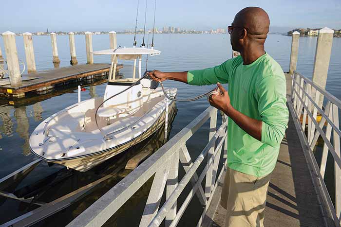 Dragging boat into dock slowly