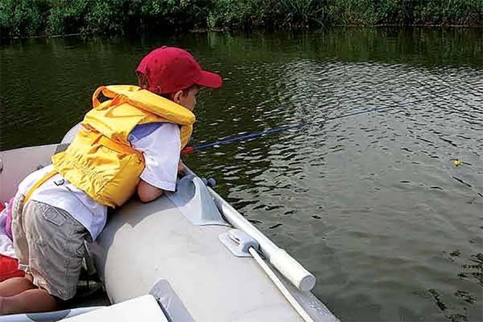 Young boy fishing