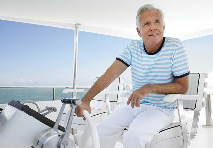 Older gentleman at the helm