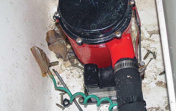 Bilge choked with trash and debris