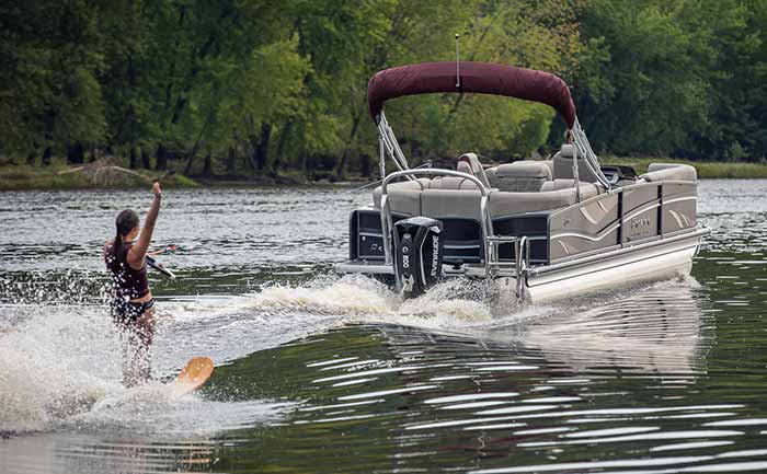 Pontoon towing water skier