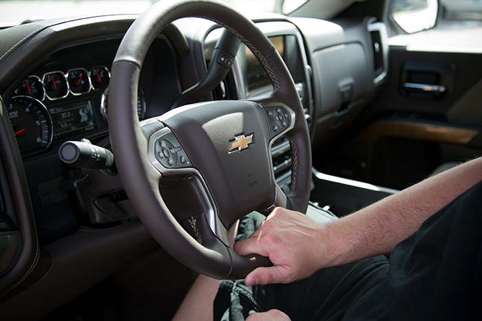 Gripping the steering wheel