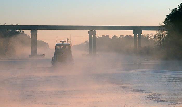 Navigating fog under bridge
