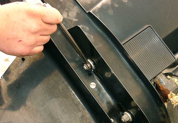 Remove nuts that hold lower unit