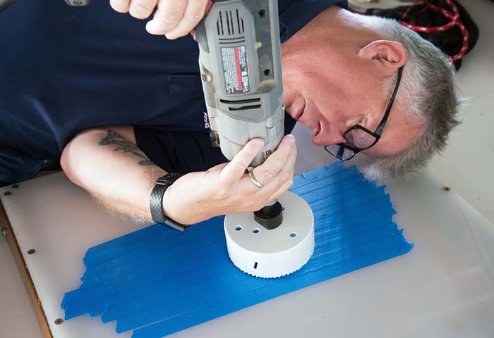 Drilling through lexan