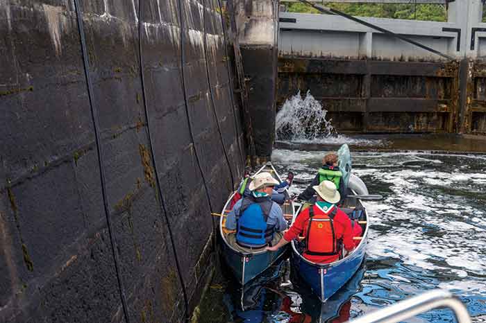 Scout kayakers locking through