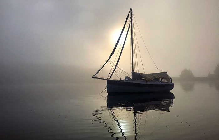 Sailboat in fog