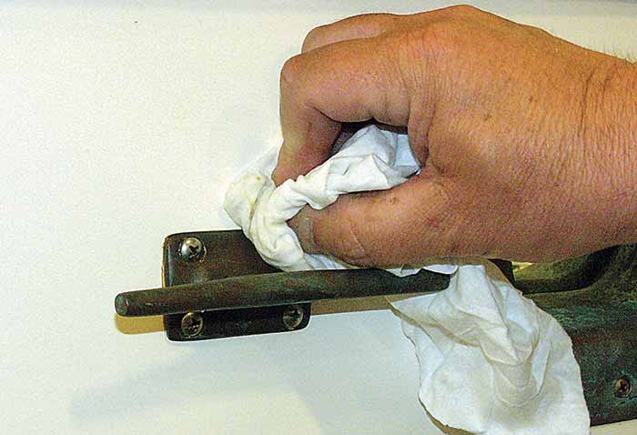 Wiping final installation of fitting with solvent