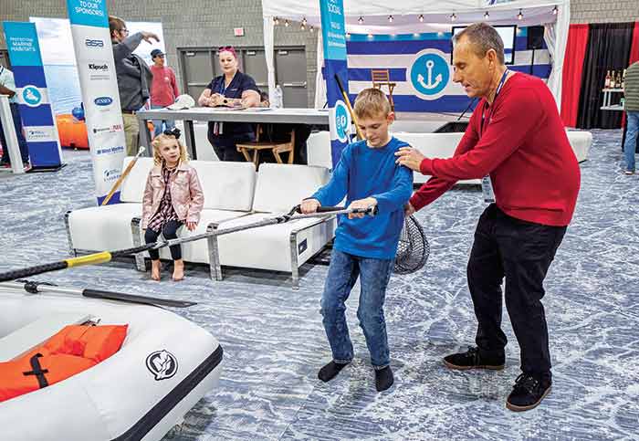 Bilas coaches a seminar attendee during one of his presentations
