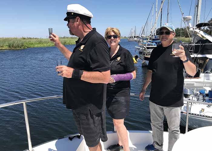 The crew pays homage to Neptune for a safe passage to Owl Harbor