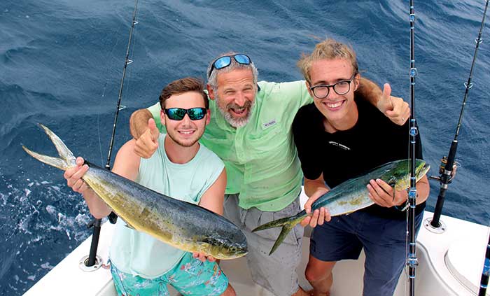 Lenny Rudow with family and their catch