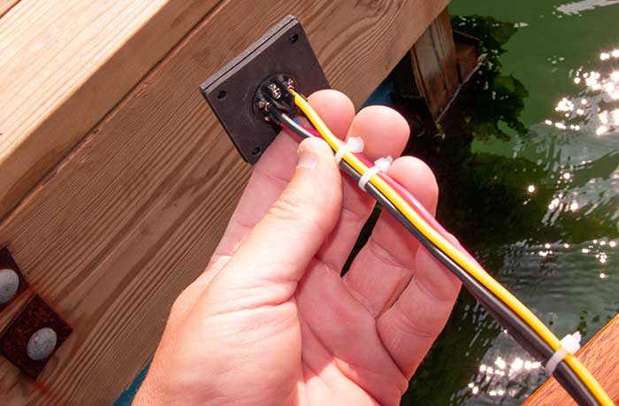 Small setscrews hold the wires into the back of the socket