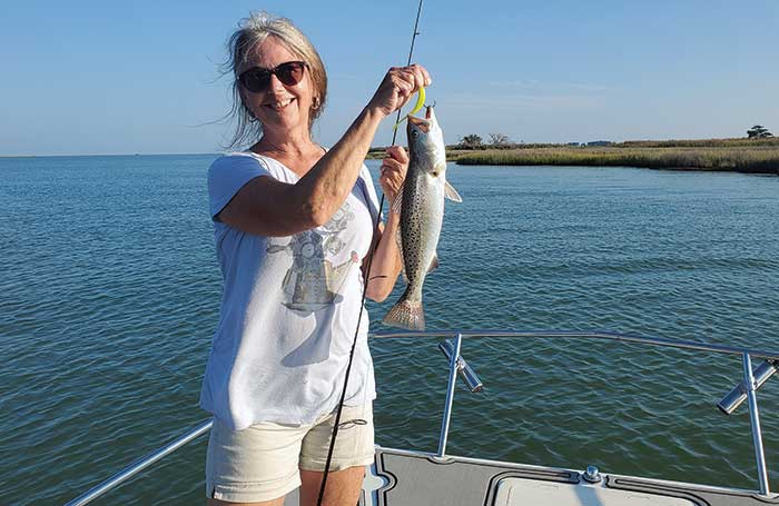 Melissa with trout catch