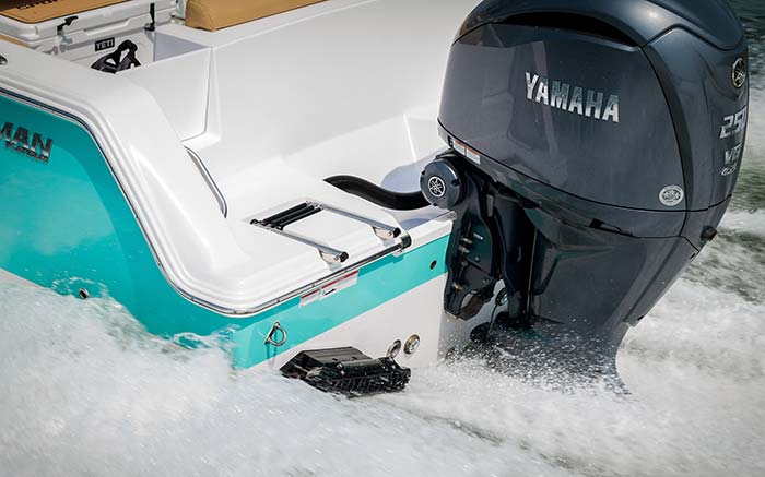 Closeup of a Seakeeper ride vessel attitude control system being used on a powerboat cruising a full speed