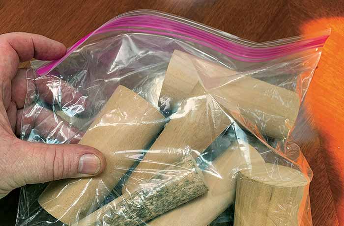 Bag of various sizes of soft wooden plugs and wedges