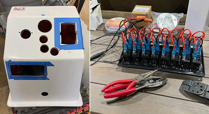 Photo of old hull on the left and workbench with electrical board, plers and other tools on it