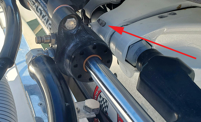 Red arrow pointing to a hidden zerk that is needing grease.