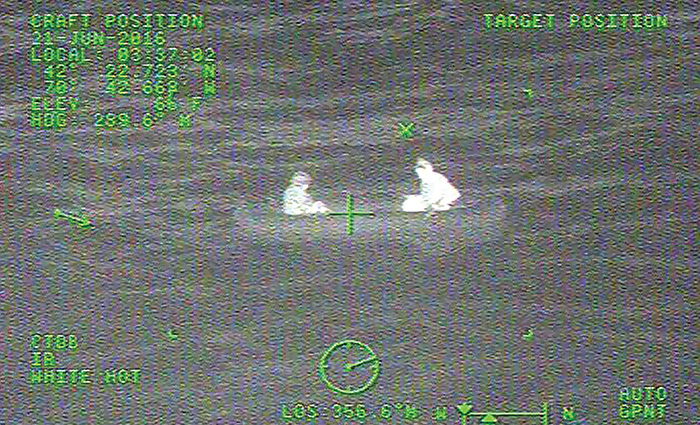 Night vision view of a missing couple drifting on a raft waiting to be saved.