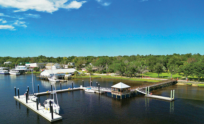 Ariel view of a marina on a sunny day.