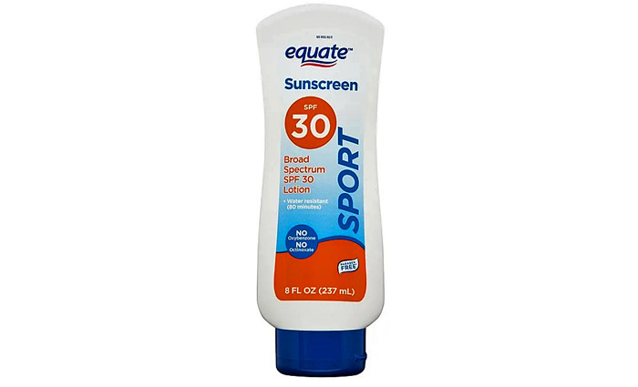 White, red and blue bottle of Equate Sport Broad Spectrum  Sunscreen Lotion