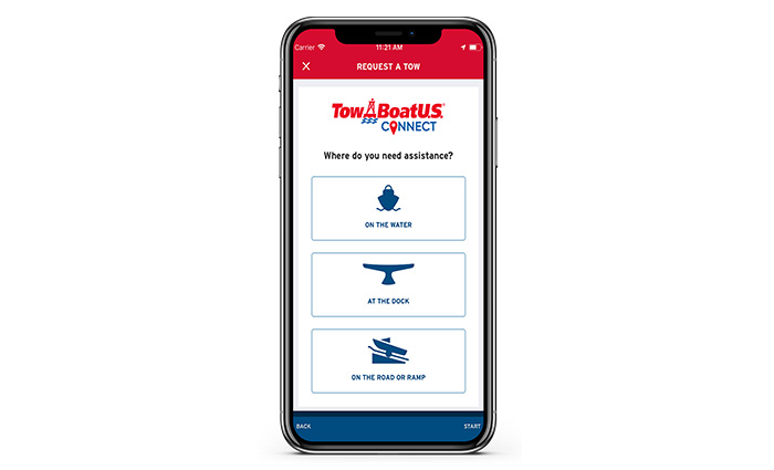 Mobile device displaying Tow BoatUS red and blue application in use
