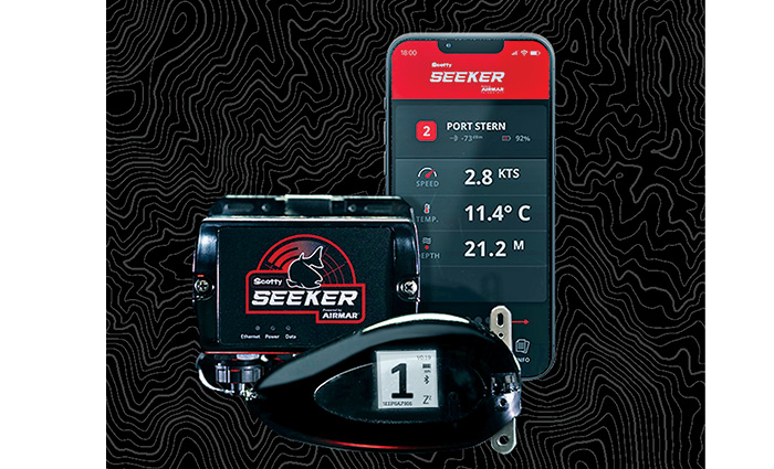 Black probe alongside its battery and a SMART phone displaying the mobile app and view of the probe in use.