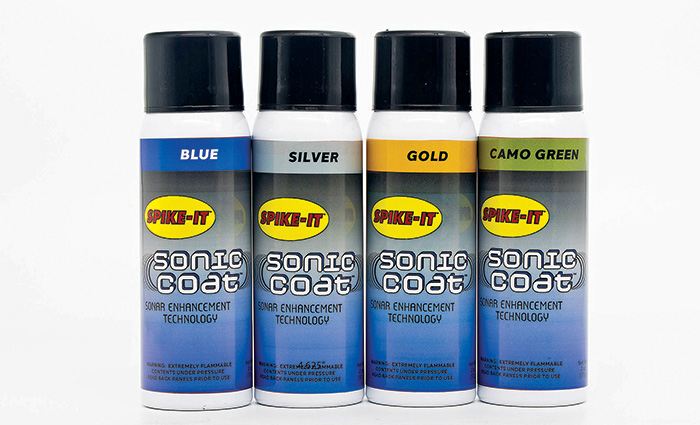 Four cans of Spike-It Sonic Coat spray.