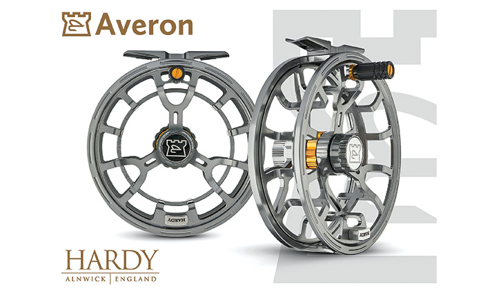 Two Hardy Averon fishing reels with gold accents and black gunmetal accents.