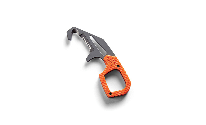 Silver harness rescue tool with orange handle.