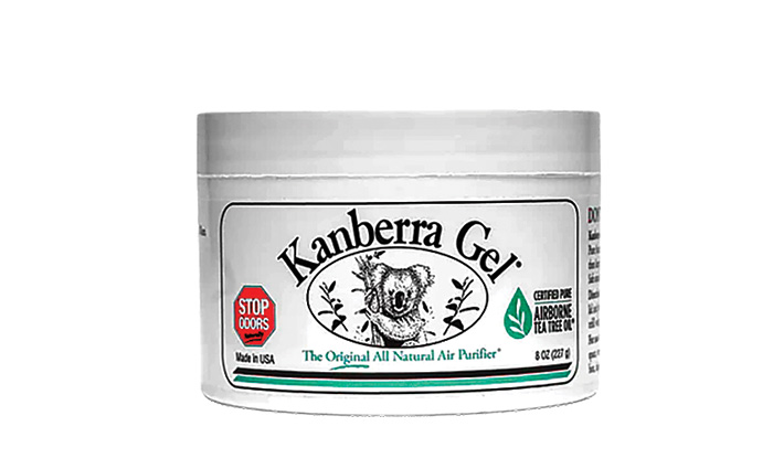 White, black and green container of Kanberra Gel