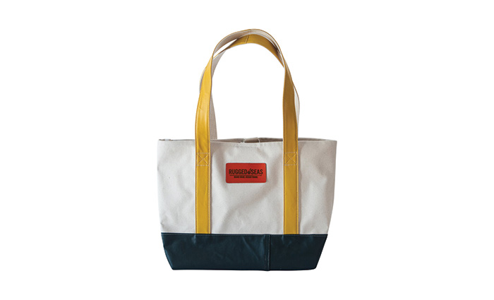 White, black and red tote bag with yellow handles