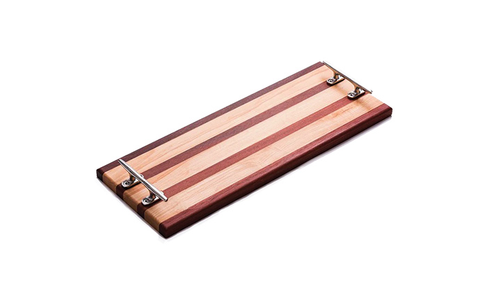 Wooden cheese board with two silver handles.