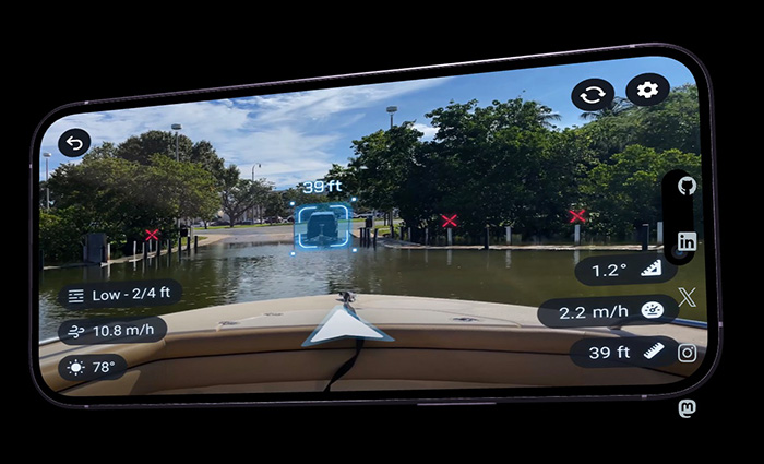 Video display on an iPhone showcasing a boat loading on a trailer.