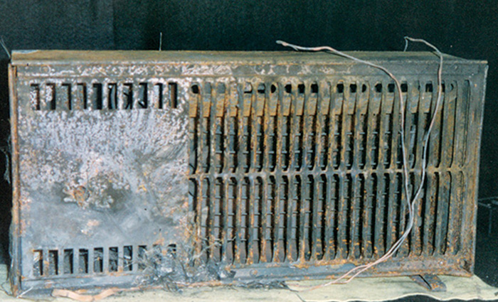 Burnt and rusted eclectic heater.