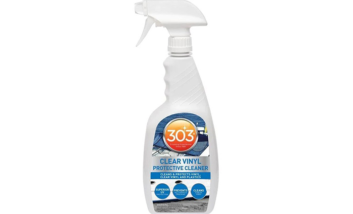 White spray bottle with orange and white 303 label.